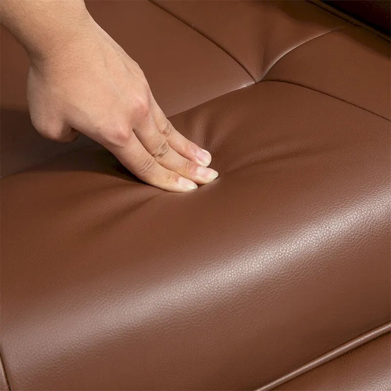 Fauteuil lounge pivotant réglable en cuir avec repose-pieds et accoudoirs