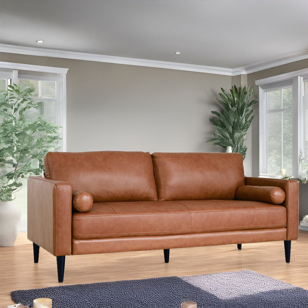 Canapé moderne en cuir véritable avec pieds en bois et coussin cylindrique supplémentaire